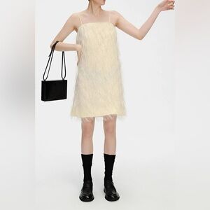 Elegant Cream Feathered Skirt